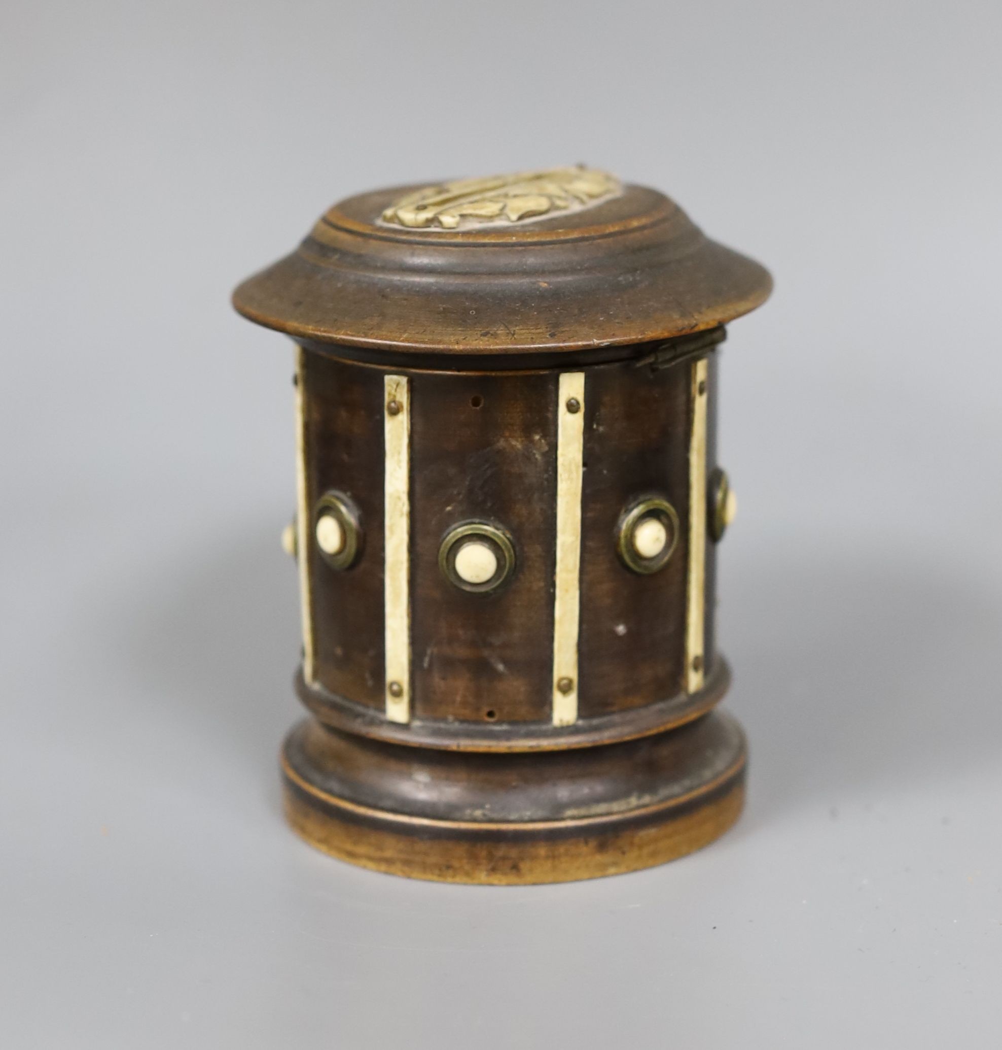 A 19th century ebonised walnut money bank, 9.5cm